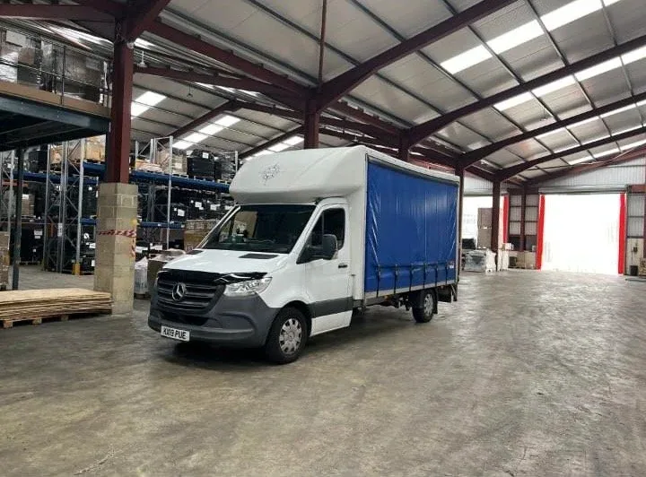 Compass Cargo van inside a warehouse