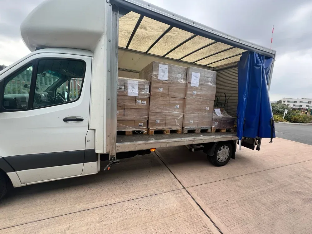 Pallets secured inside a Compass Cargo curtain-side truck